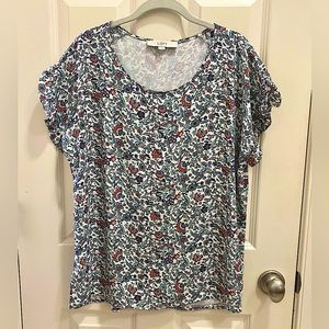LOFT mixed media short sleeve shirt in a blue floral print. Size-Medium